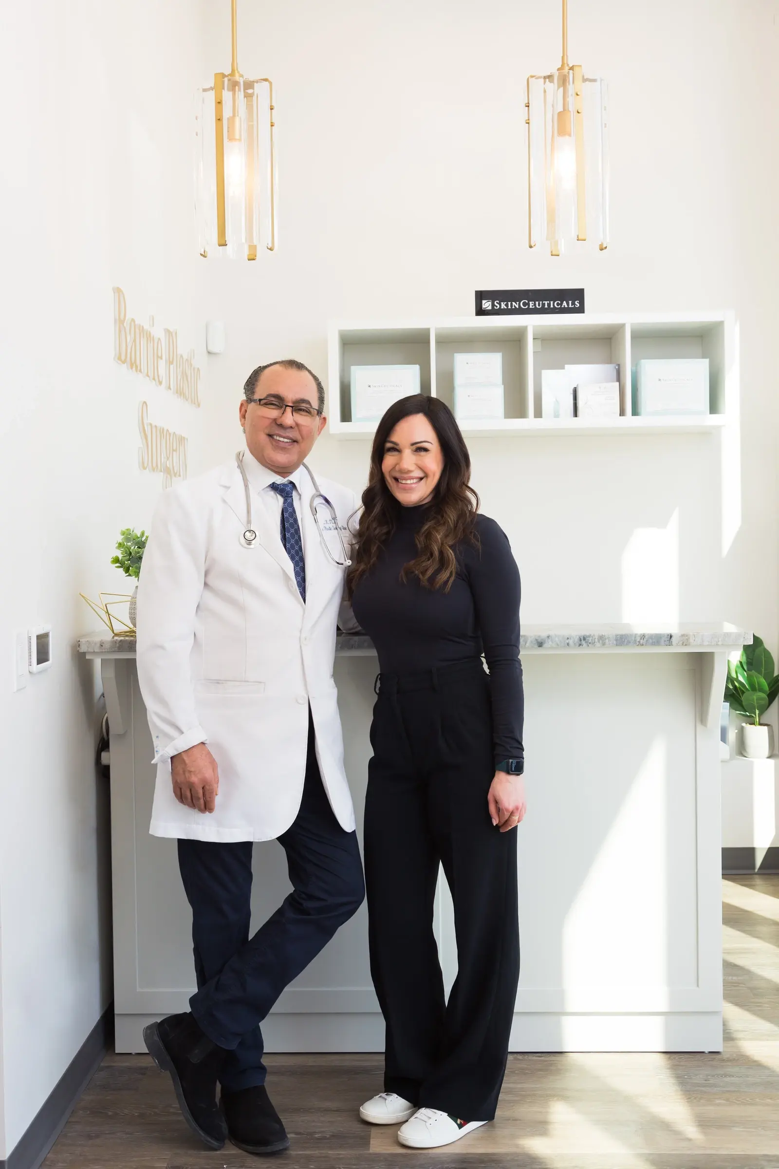 Dr. Kamal Tumi with a team member at the Barrie Plastic Surgery reception